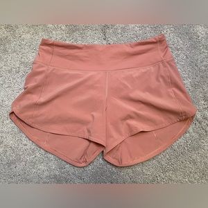 Lululemon 4 inch coral high rise speed up shorts size 6